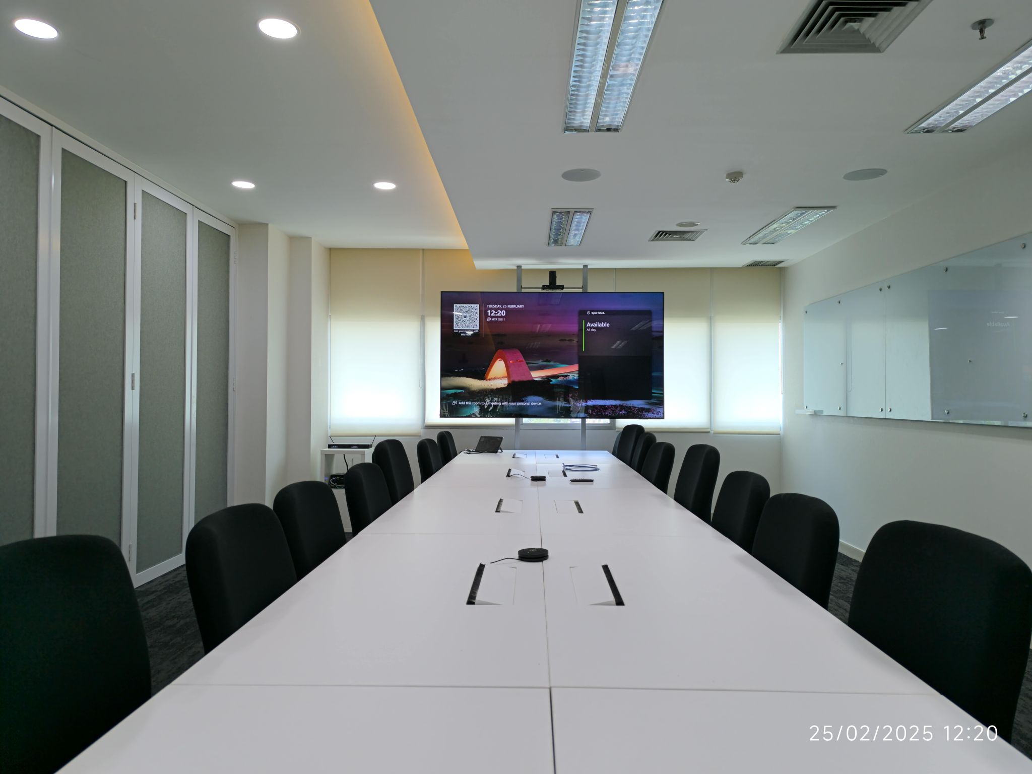 Inmedia team installing AV system in Jakarta office